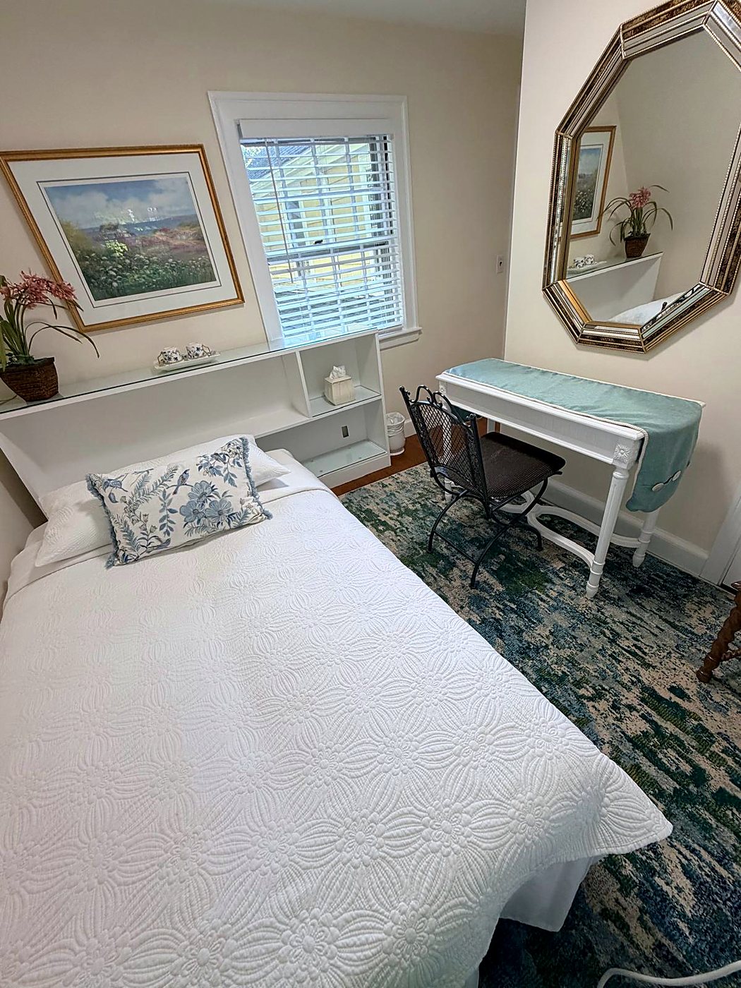 The second room of the Two-Room Suite, with its own writing desk and mirror, at Wellesley Boutique Inn in Wellesley, MA